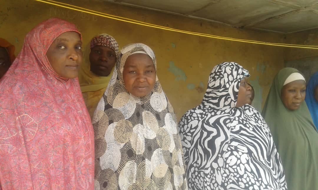 Women receiving support during a Maidabo Foundation distribution