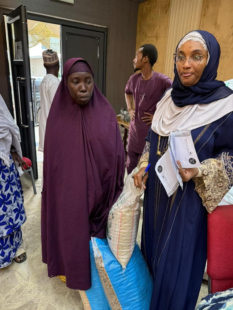 Women receiving help through Maidabo Foundation programmes